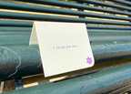 A small folded cream greeting card with printed text reading 'I think you are.